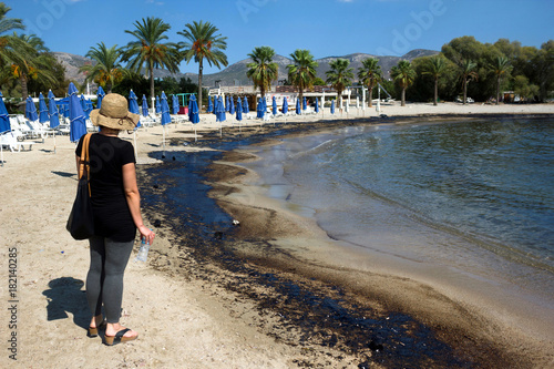 Athens, Greece, September 14 2017: Greek oil spill spreads to Athens Riviera following the sinking of an oil tanker in Saronic Gulf. photo