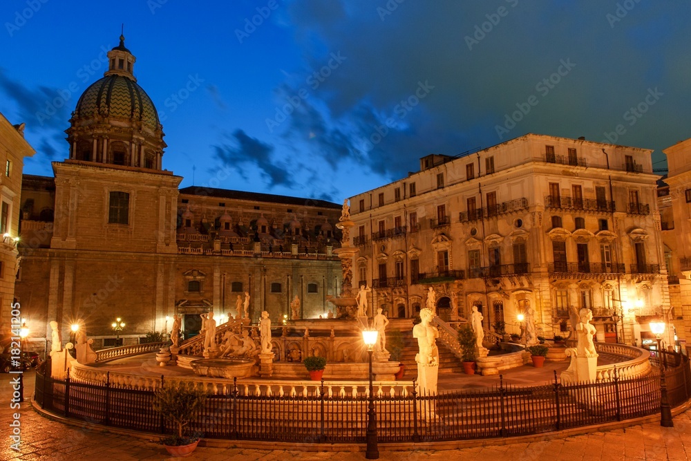 Palermo, Sicily, Italy - night view of Fountain of shame on baroque Pretoria square at night