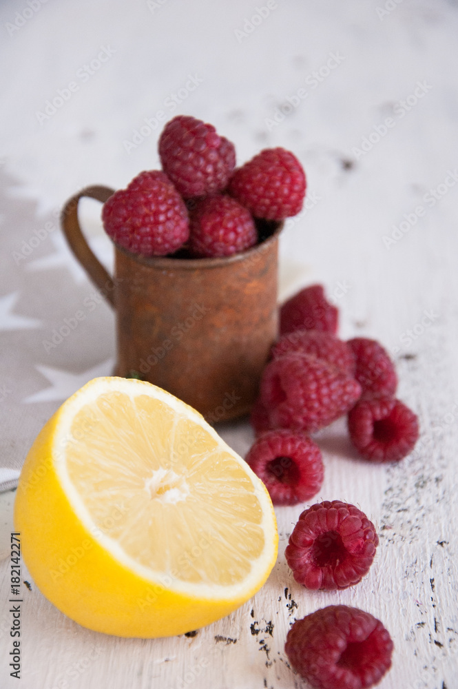 Fresh raspberries and lemon Fresh raspberries and lemon