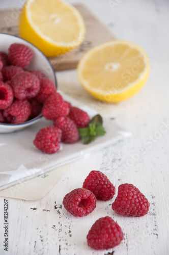 Fresh raspberries and lemon