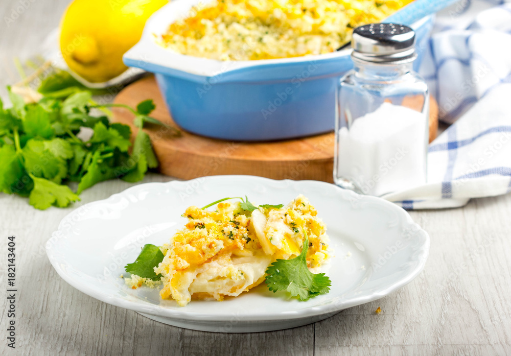 Casserole with crispy crumble, potato gratin, baked meat butter cheese dish, tasty homemade dinner Casserole with crispy crumble, potato gratin, baked meat butter cheese dish, tasty homemade dinner