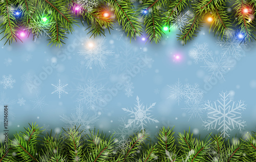 Christmas background green fir tree branches and snow