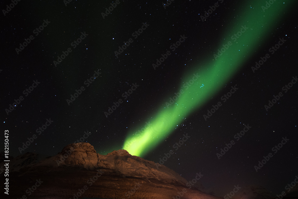 Aurora borealis over lyngen alps & Ersfjord