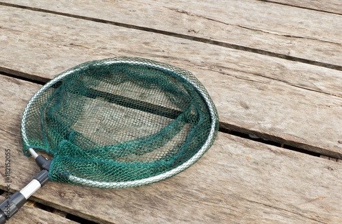 fishing net on wooden background