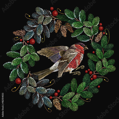 Embroidery christmas tree wreath and red bullfinch.  Merry Christmas classical embroidery snow-covered branch of a fir-tree. Christmas fashion t-shirt art