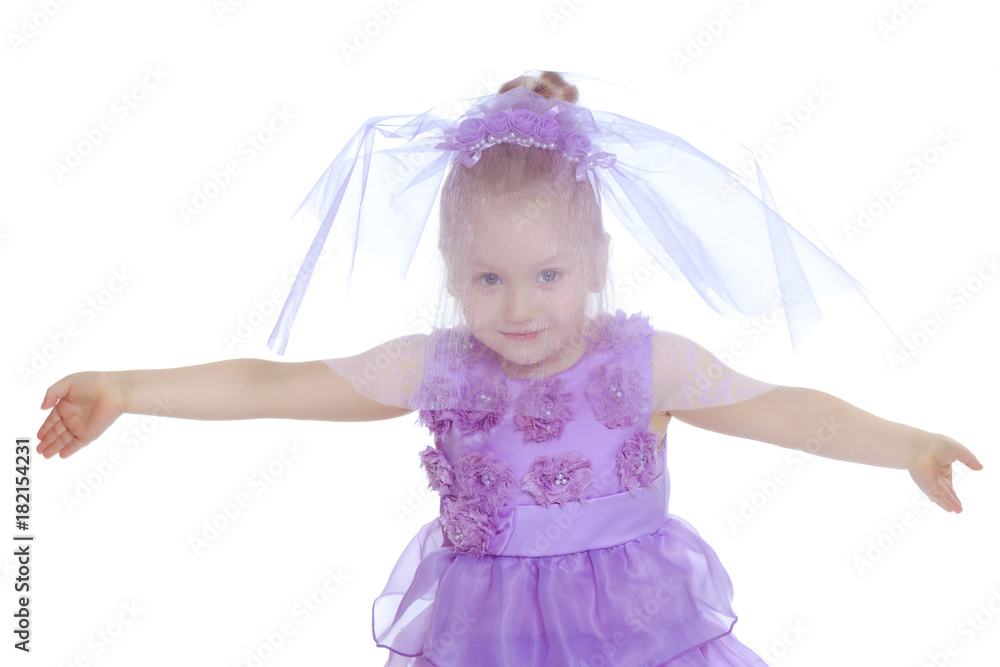 Little girl in purple dress.