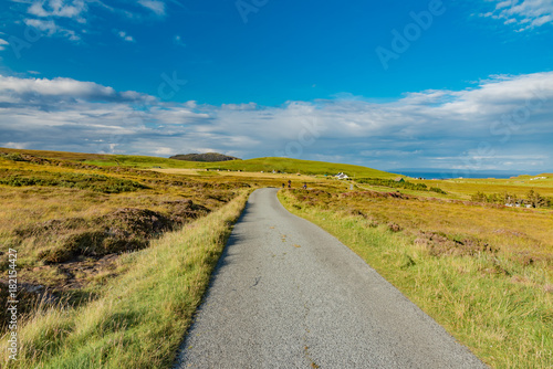 lands between sky and ocean panorama of Scotland in England in summer