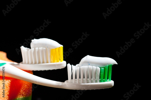 New  beautiful toothbrushes on a dark background