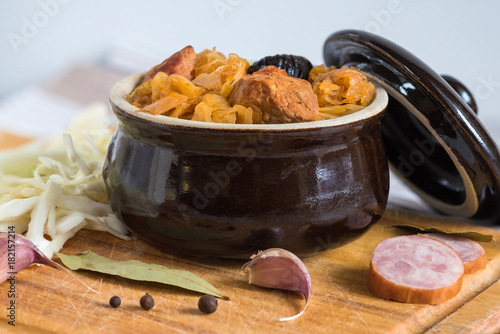 Bigos-traditional Polish dish of finely chopped meat, mushrooms, and sausage with sauerkraut and shredded fresh cabbage. The dish is also traditional for Belarusian, Ukrainian and Lithuanian cuisine. photo