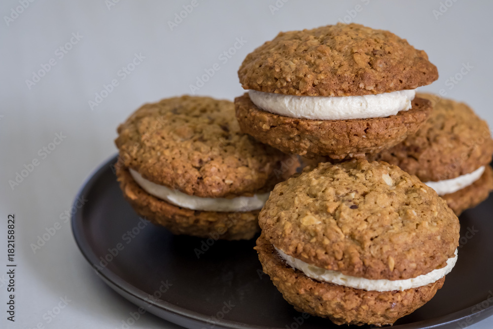Close up Homemade Malt and Oat Cookie Sandwiches . (selective Focus)