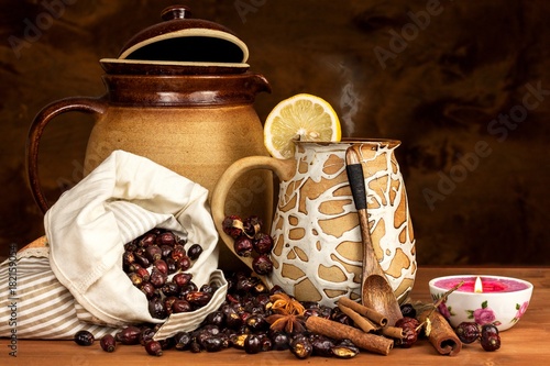 Hot rosehip tea against influenza. Home cold treatment. Dried vitamins. Traditional folk medicine.