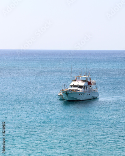 Small yacht at sea