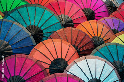 Colorful traditional paper umbrellas on market. Laos, Luang Prabang