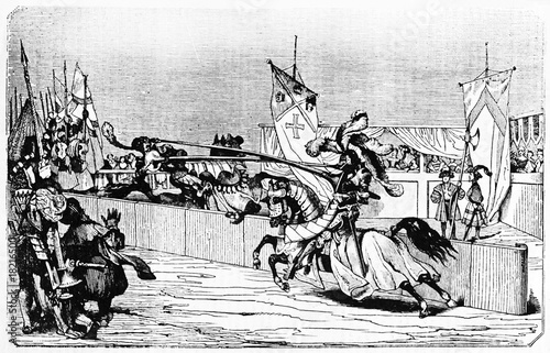 Fotografija Medieval tournament with ancient knights battle on horse using the lance