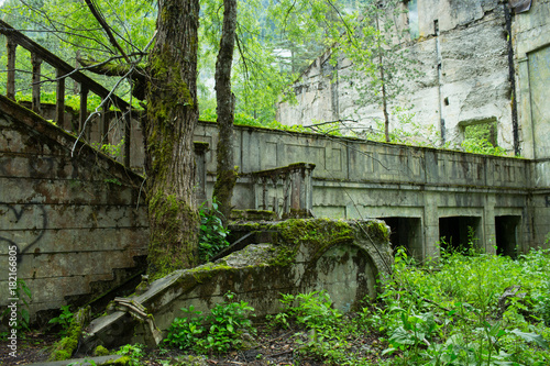 Ruins of the side of the building on the shore of Lake Ritsa. Abkhazia photo