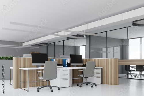 White office corner wooden desks concrete side © ImageFlow