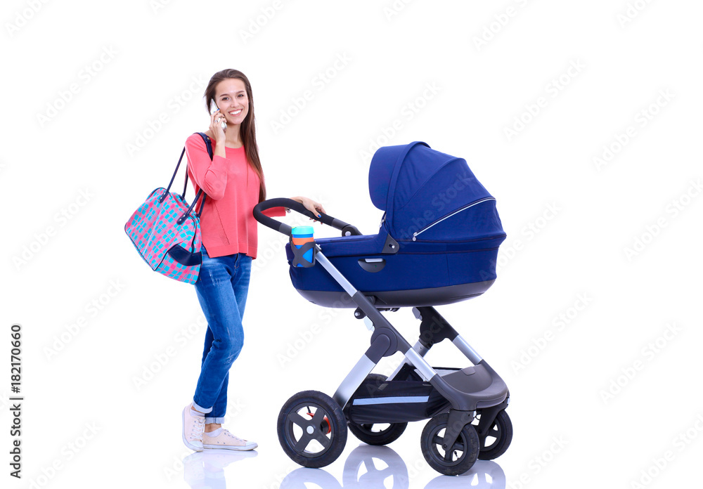 Full length portrait of a mother with a stroller, isolated on white background. Young mom Full length portrait of a mother with a stroller, isolated on white background. Young mom
