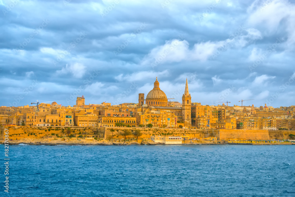 beautiful scene of Basilica Our Lady Mount Carmel in Valletta from Sliema, Malta