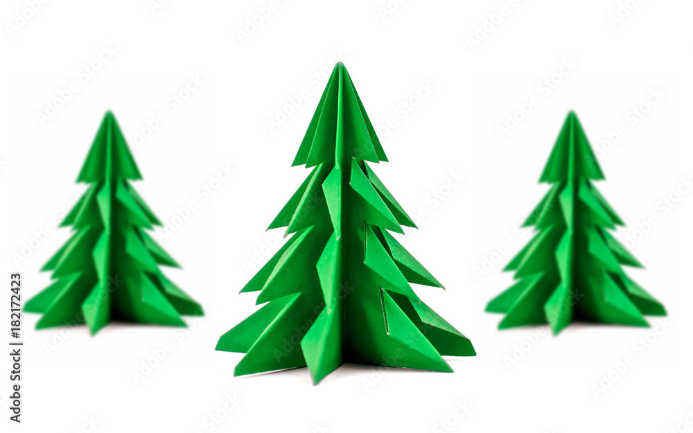 Set of origami Christmas tree paper isolated on white background. For decoration, Merry Christmas postcard vintage with red and green paper. Happy New Year. Front view. Close up. Set of origami Christmas tree paper isolated on white background. For decoration, Merry Christmas postcard vintage with red and green paper. Happy New Year. Front view. Close up.
