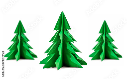 Set of origami Christmas tree paper isolated on white background. For decoration, Merry Christmas postcard vintage with red and green paper. Happy New Year. Front view. Close up.