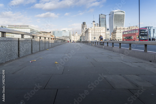 London, UK - November 22nd, 2017: Anti-vehicle barriers erected on the pavement on London Bridge in the Borough area, Southwark, London SE1 as a terrorism prevention measure