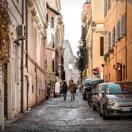 Canvas Print ROME. People on the street with view on Coliseum in Rome, one of