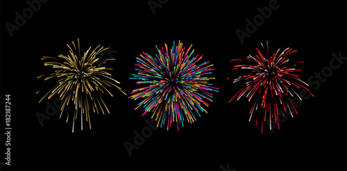 Colorful confetti or fireworks explosions isolated on black photo