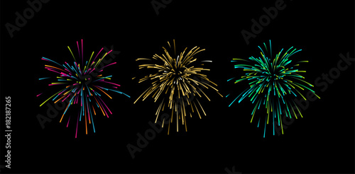 Colorful confetti or fireworks explosions isolated on black photo