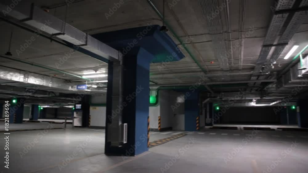 New modern empty underground parking garage for cars, auto park interior inside New modern empty underground parking garage for cars, auto park interior inside