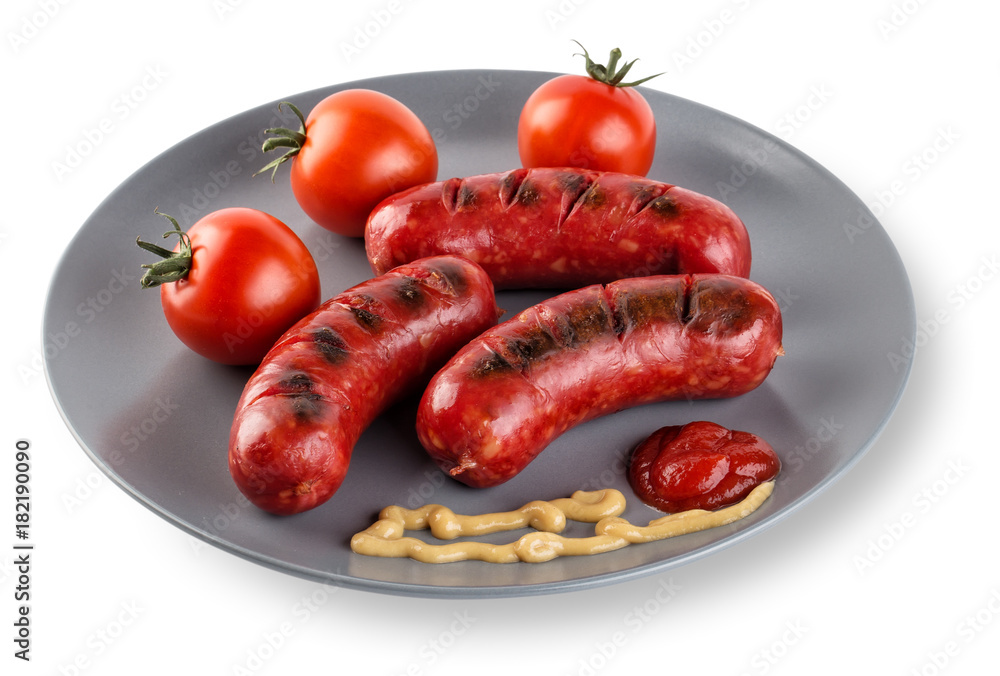 Fried sausages with tomatoes mustard and ketchup on plate Fried sausages with tomatoes mustard and ketchup on plate