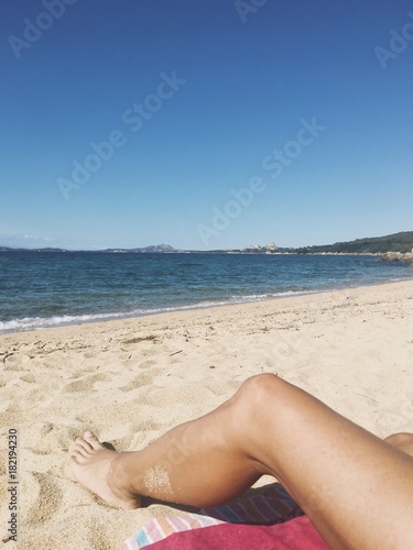 man on the beach of Sardinia, Italy © nito