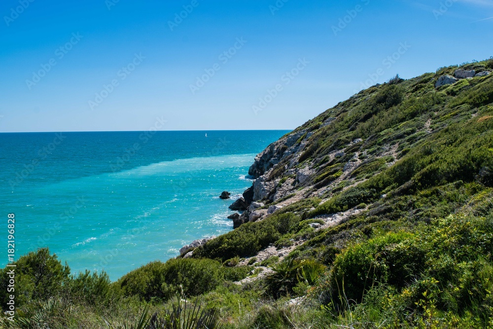 Rocky beach, coastline with turquoise sea, Spain