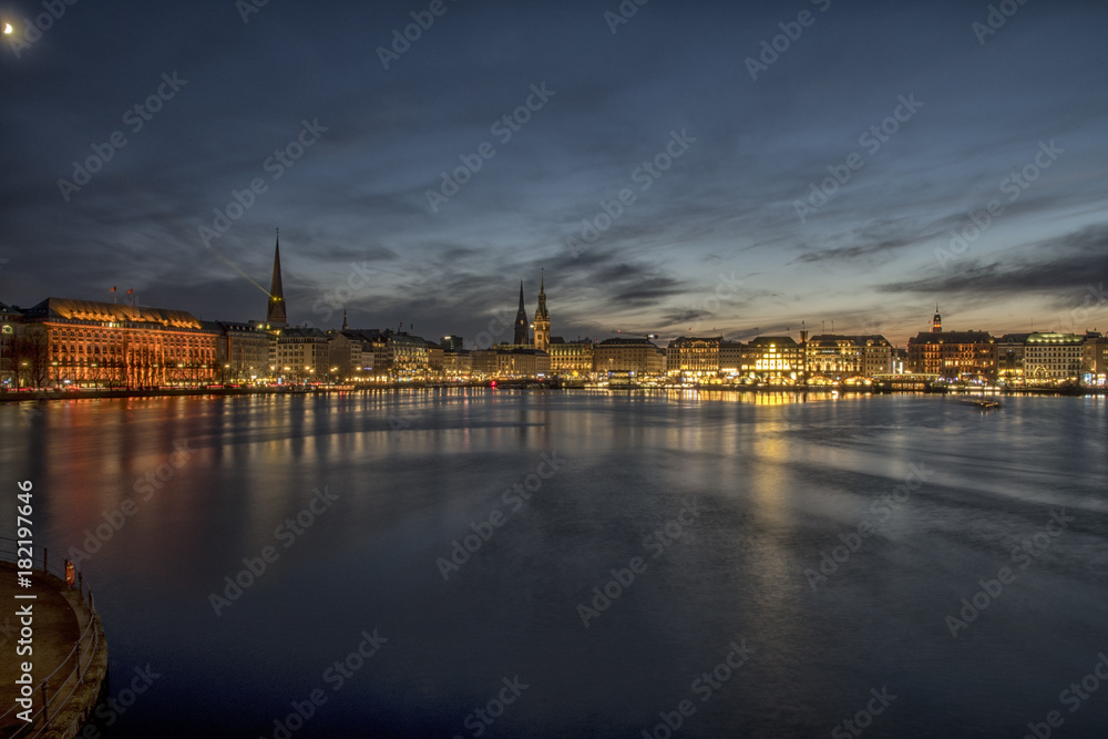 nightly panorama over the lake Alster into the city of Hamburg Germany