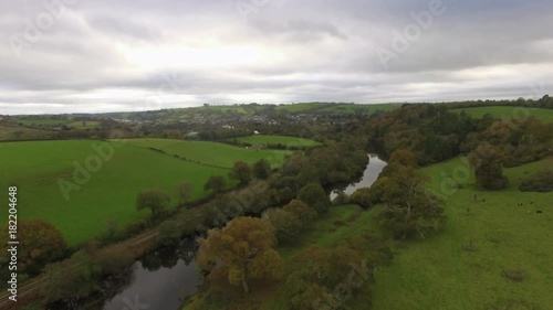 Aerial drone footage of River Dart, Dartington landscape, Devon photo