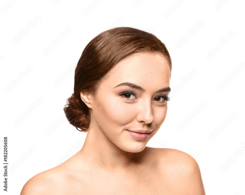 Portrait of beautiful young woman with eyelash extensions on white background Portrait of beautiful young woman with eyelash extensions on white background