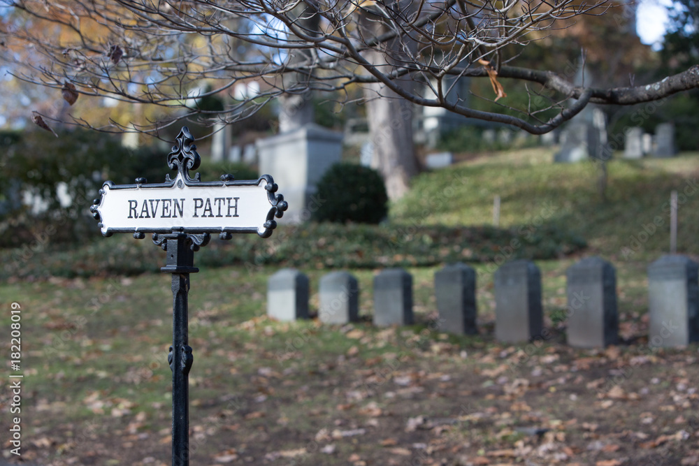 raven path sign in a cemetery