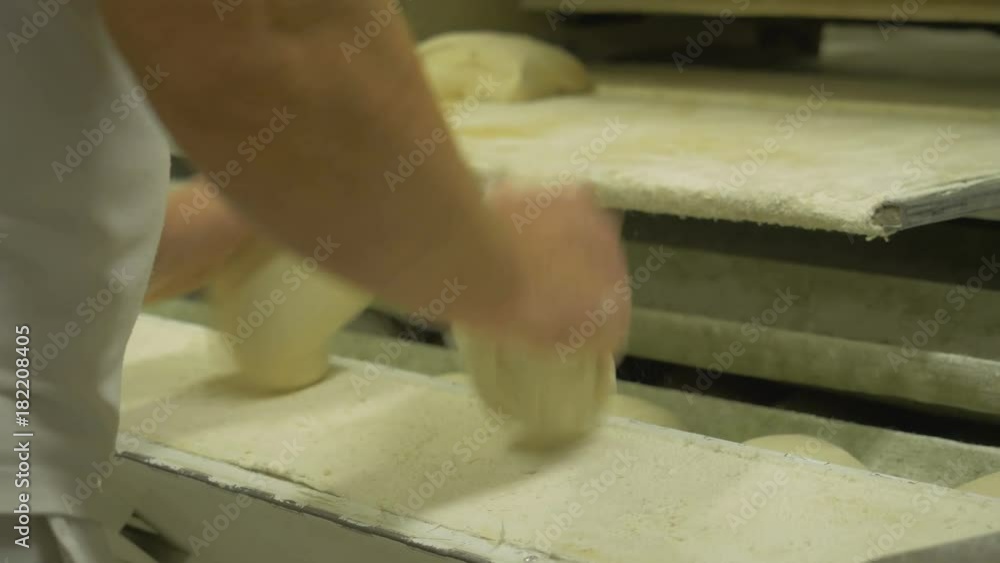 Manufacture of bakery products. The baker is making dough products. Manufacture of bakery products. The baker is making dough products.