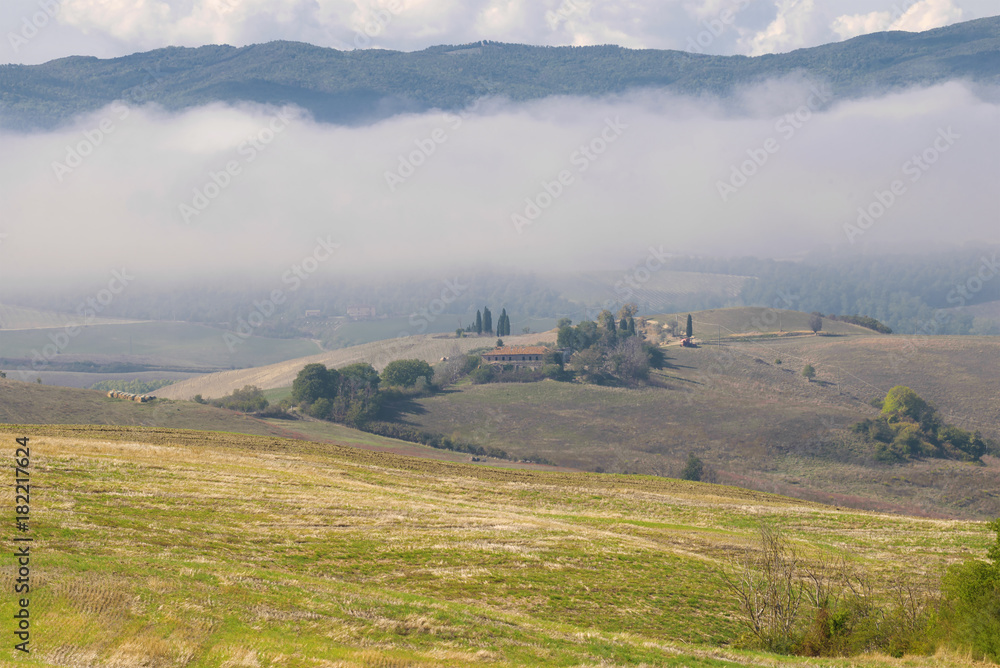 Fototapeta premium Foggy morning in Tuscany. Italy