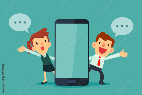 businessman and businesswomen talking beside smart phone with blank screen