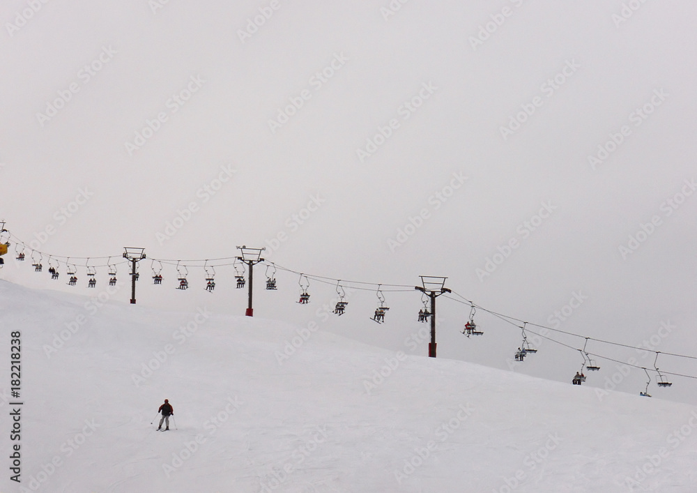 Lone Skier and chairlift