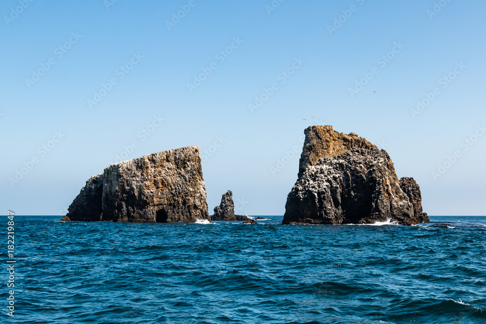 Volcanic rock formations with a sea cave at East Anacapa Island in Channel Islands National Park off the coast of Ventura, California. 