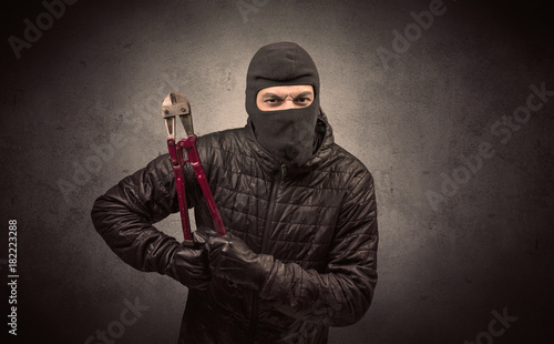 Burglar with tool.