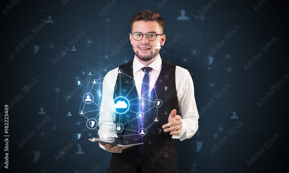 Secured cloud concept with businessman and tablet Secured cloud concept with businessman and tablet