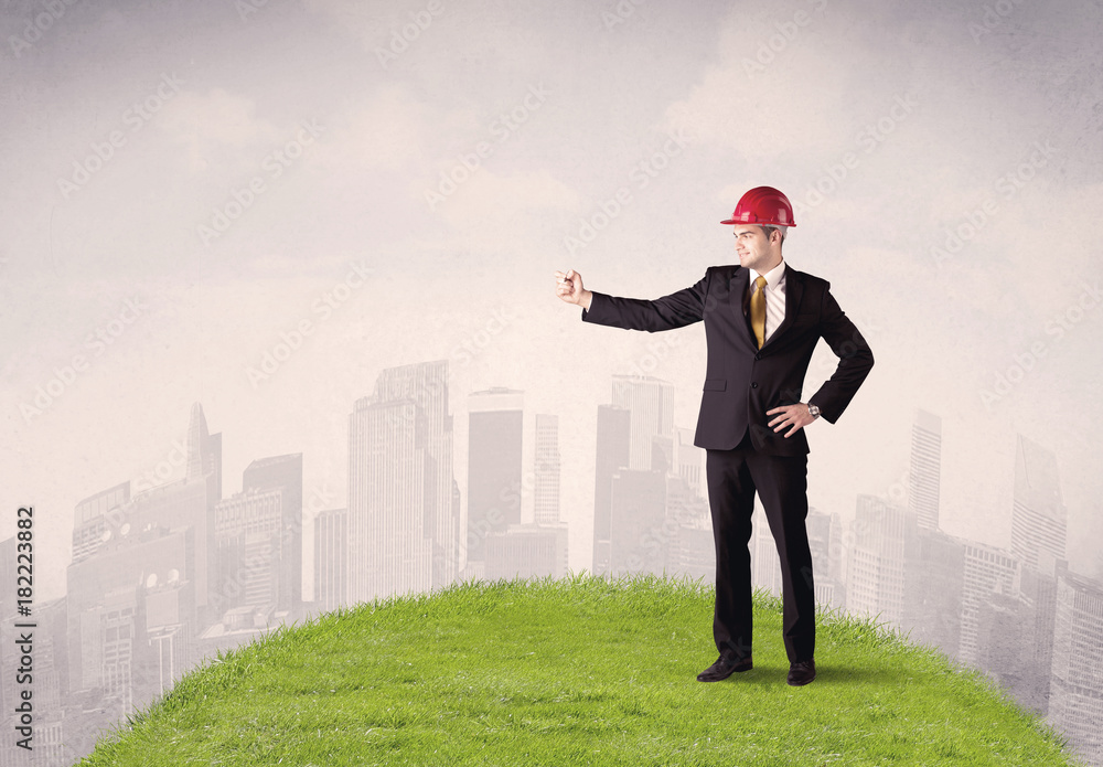 man standing in front of city landscape man standing in front of city landscape