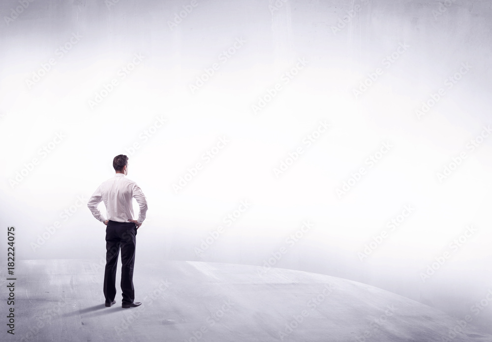 Business person standing from rear view Business person standing from rear view