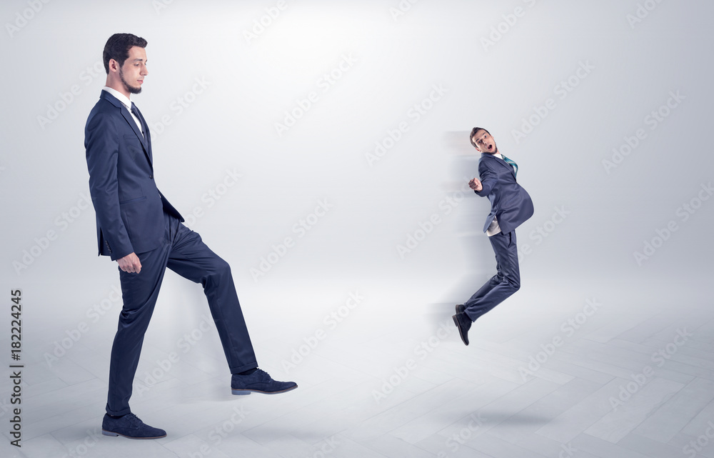 Small man fired by boss with white wallpaper Small man fired by boss with white wallpaper