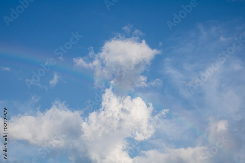 Natural real rainbow with cloud in blue sky background
