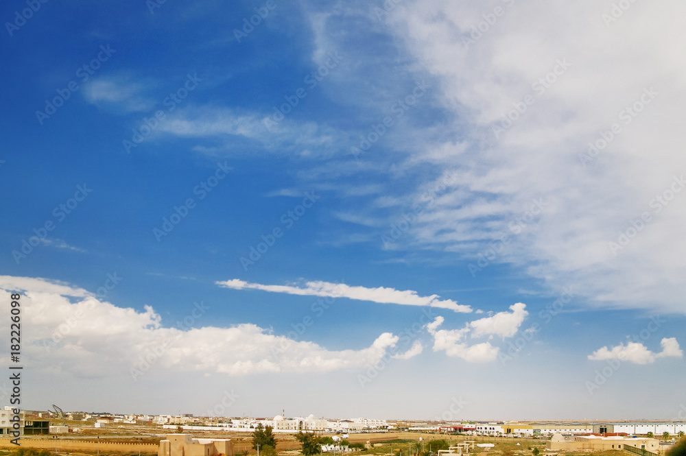 Fototapeta premium Suburbs of Kairouan city, Tunisia. Panorama view from above.