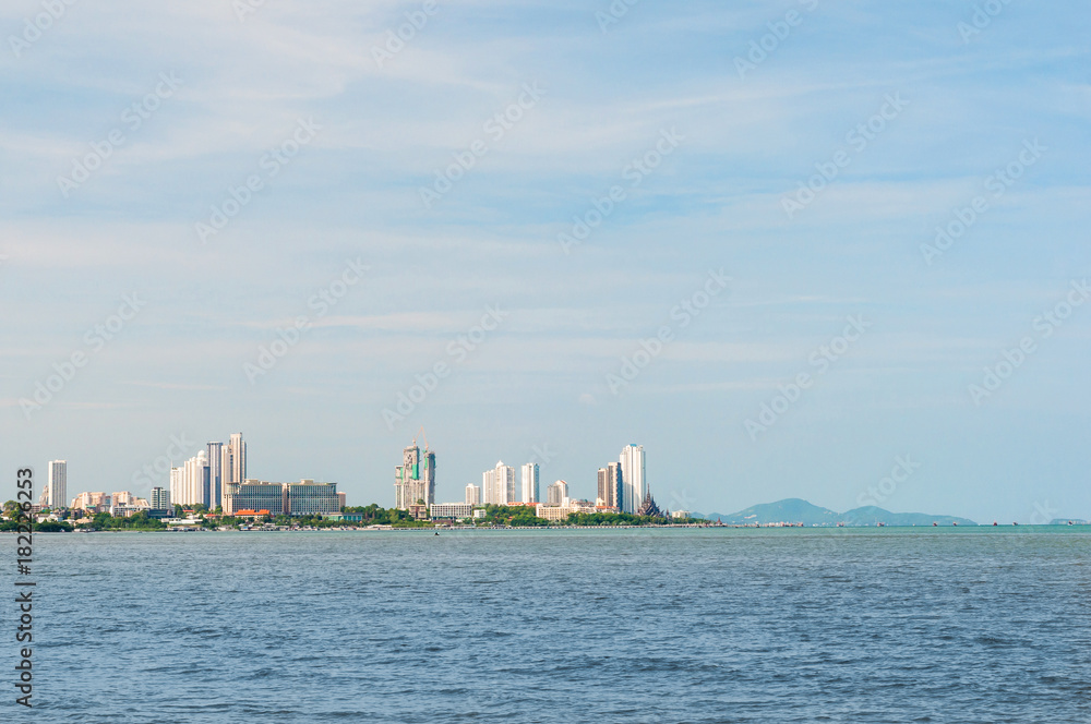 Cityscape view with water on horizon