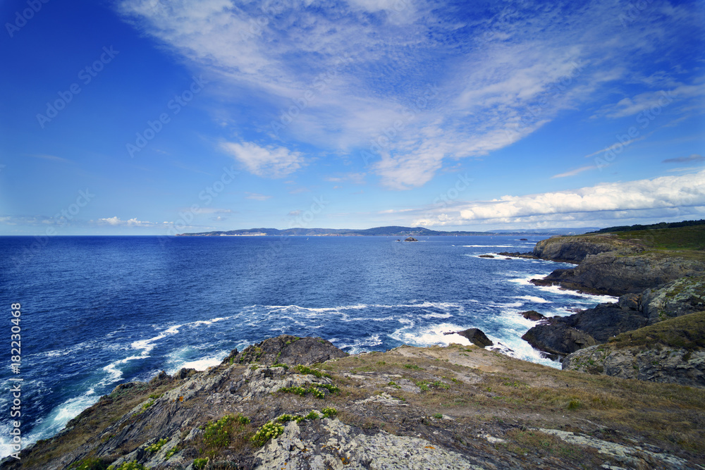 Naklejka premium Panoramic view of the coast of La Coruna (Spain) on the Atlantic ocean with the rocky cliffs typical of that coast